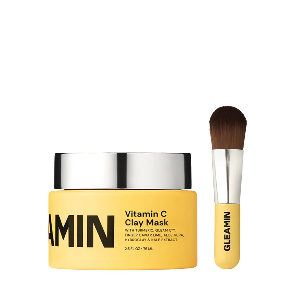 Gleamin Vitamin C Clay Mask with a brush on a white background