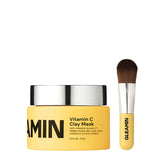 Gleamin Vitamin C Clay Mask with a brush on a white background