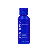 A blue bottle of Harry's Post-Shave Balm on a plain white background.