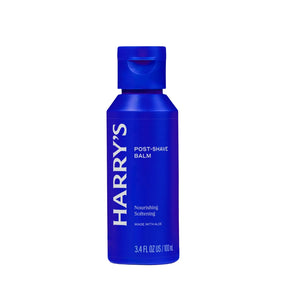 A blue bottle of Harry's Post-Shave Balm on a plain white background.