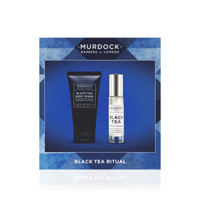 Murdock London Black Tea Ritual gift set, featuring a black body wash tube and a black tea cologne bottle presented on a blue geometric background card.