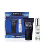 Murdock London Black Tea Ritual male grooming gift set, featuring a blue patterned gift box with two products: a black body wash tube and a clear fragrance bottle with a silver cap, on a white background.