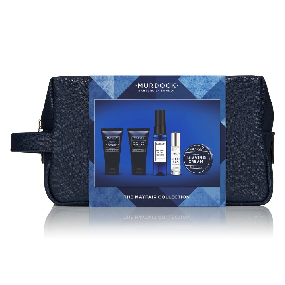 Murdock London The Mayfair Collection shaving gift set in a navy blue zippered pouch with a blue geometric window display showing the included shaving products.